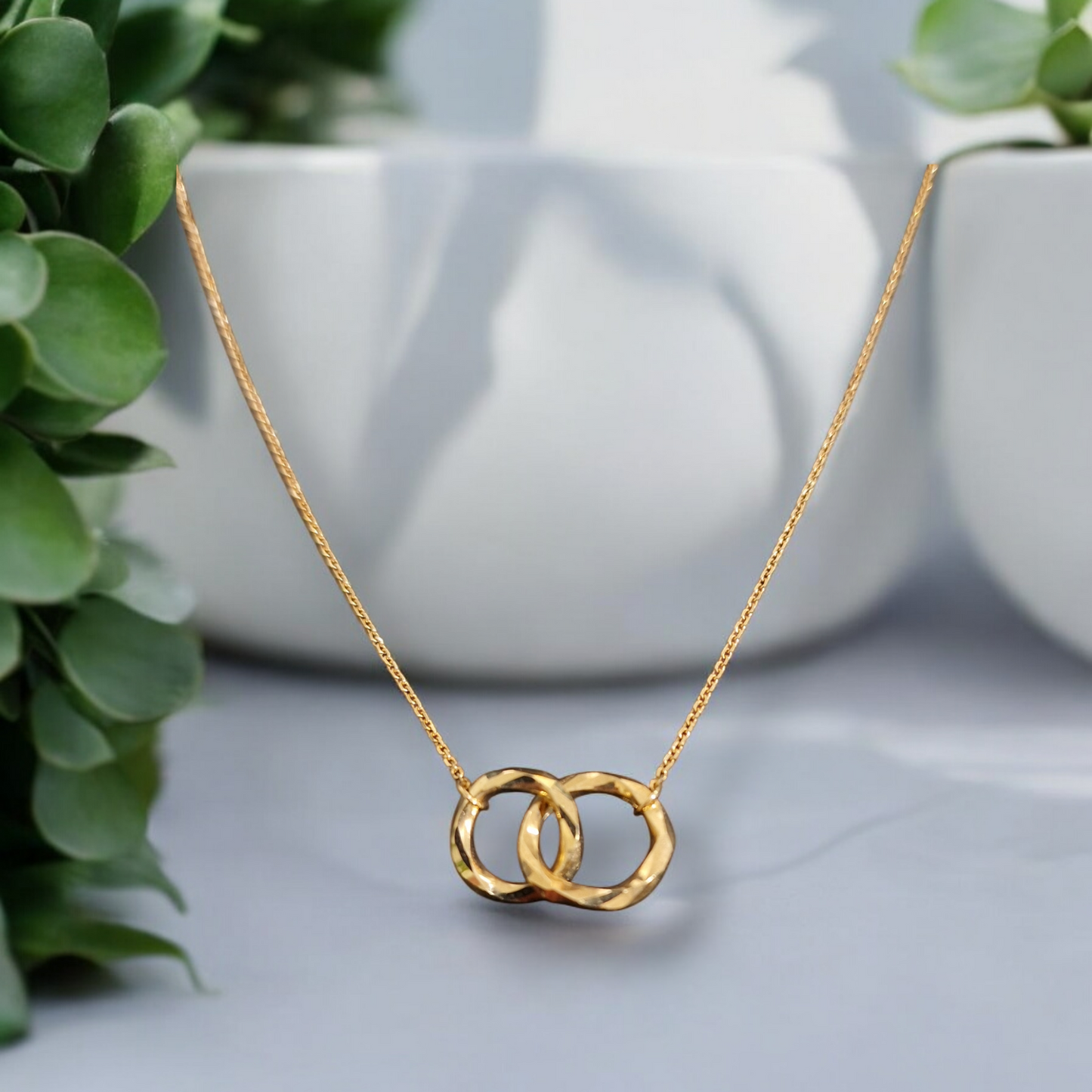 LINKED RING NECKLACE